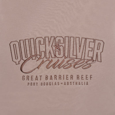 Quicksilver Cruises logo on a beige background